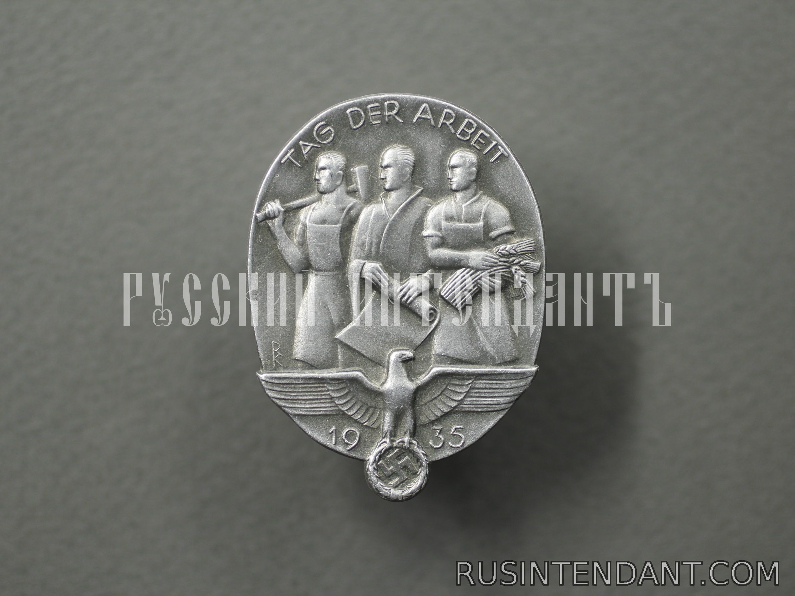 Фото 1: Знак "1 Мая 1935" 