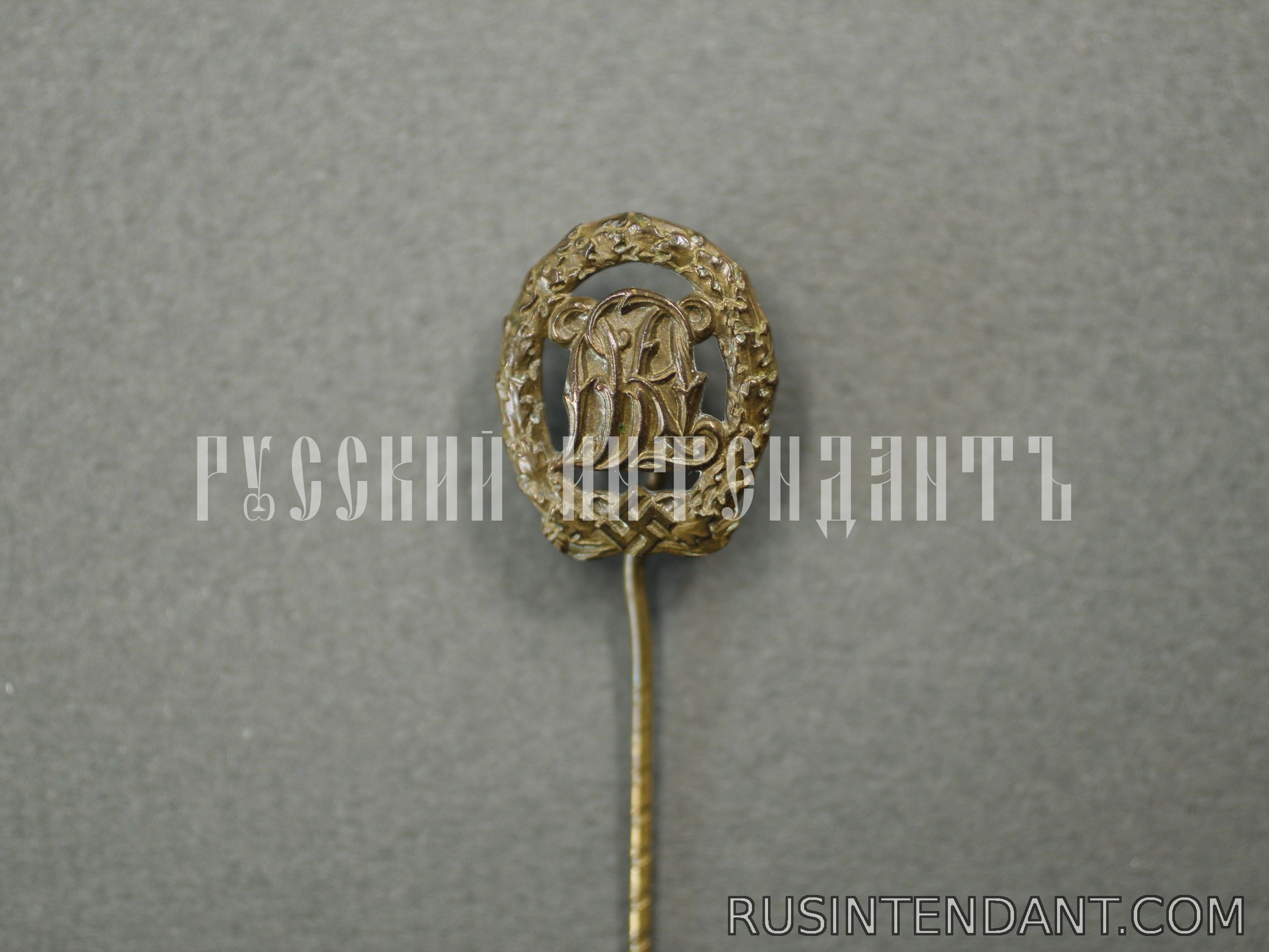 Фото 1: Миниатюра спортивного знака DRL в бронзе 