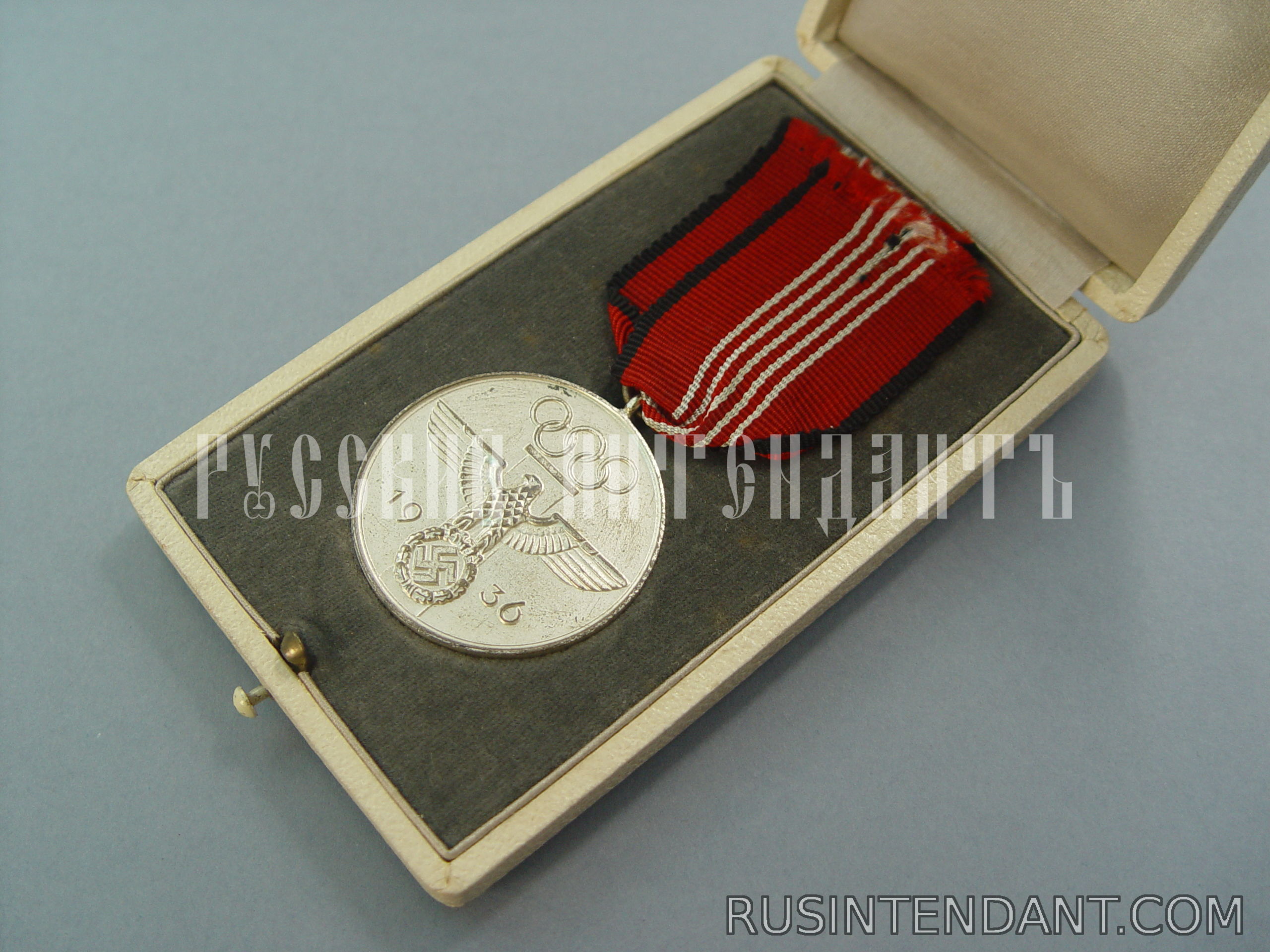 Фото 1: Памятная медаль Олимпийских игр 1936 года 