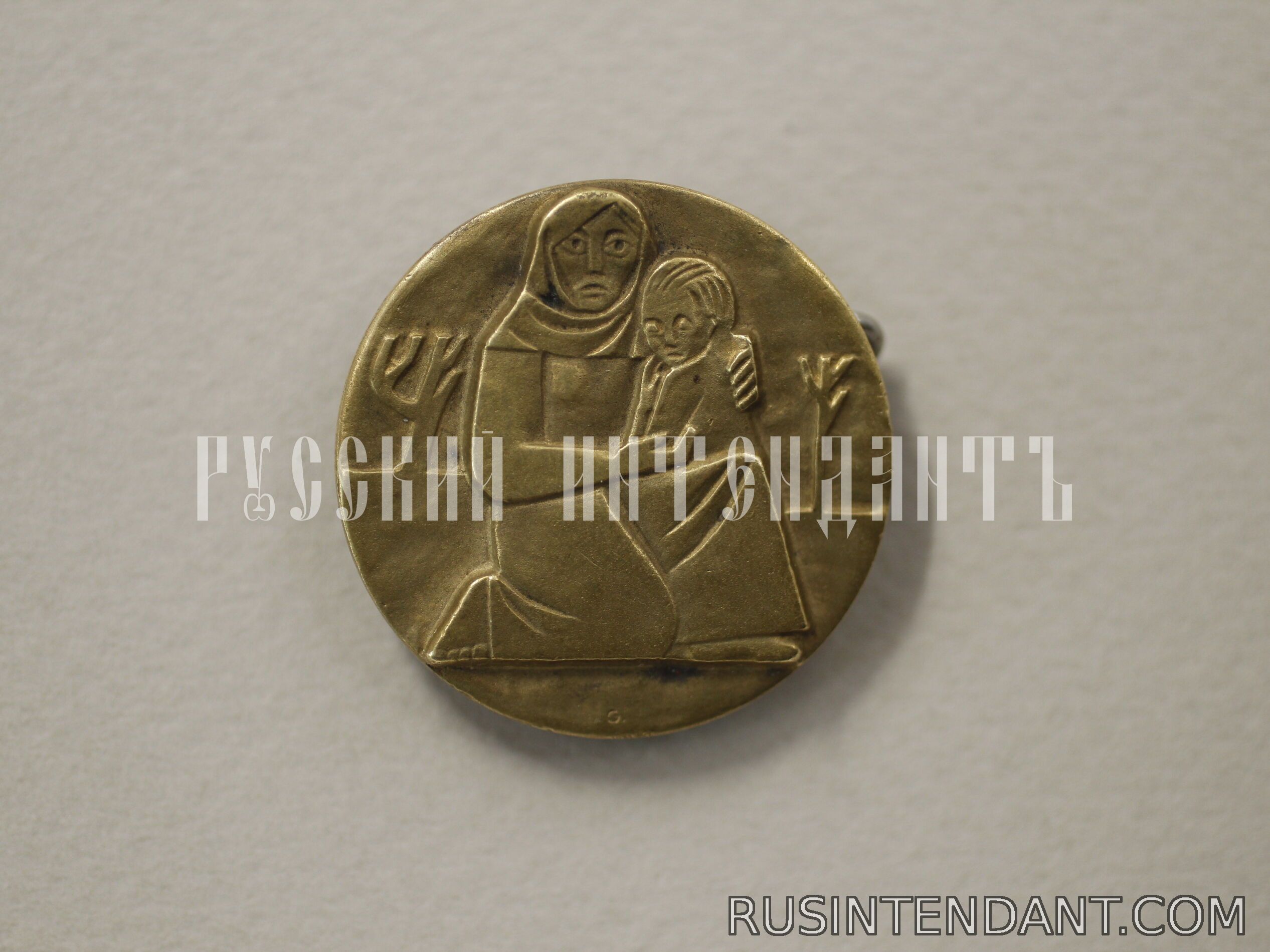 Фото 1: Знак «Зимняя помощь Швейцарии» 