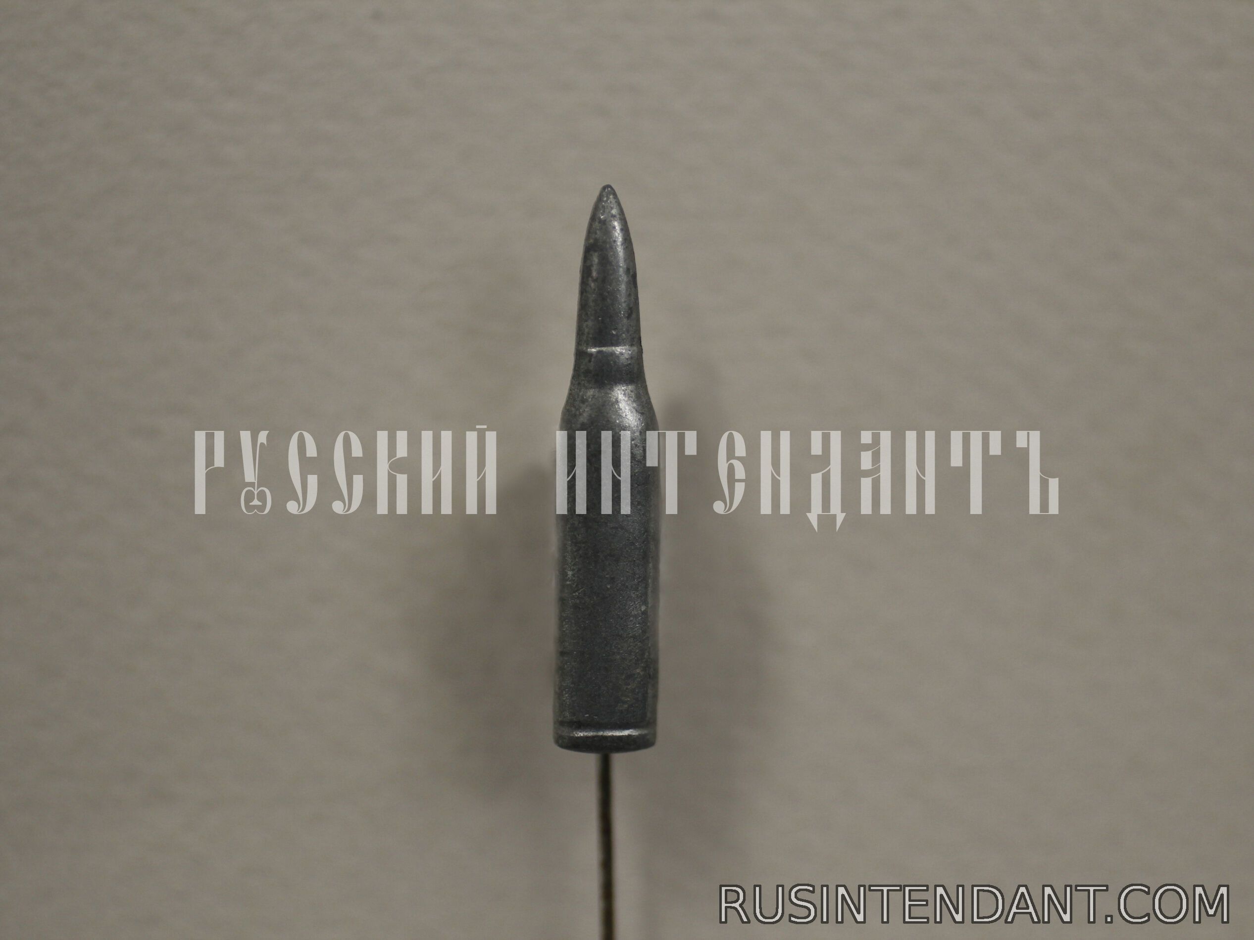 Фото 1: Знак «Винтовочный патрон» 