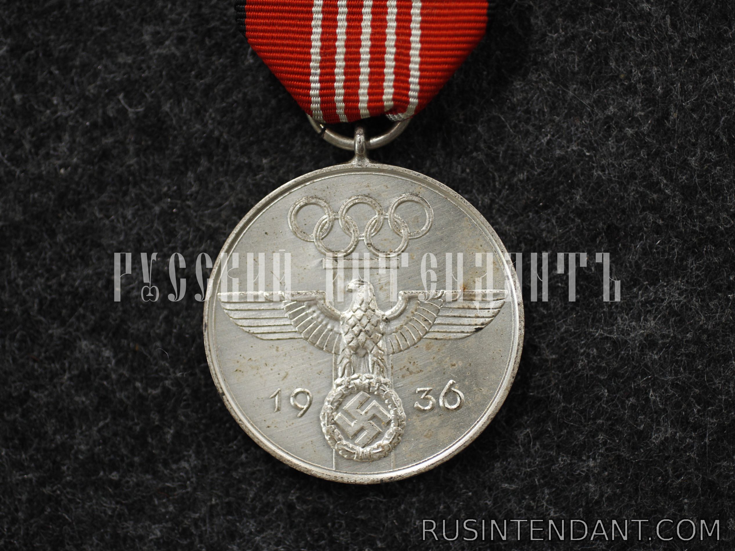 Фото 1: Памятная медаль Олимпийских игр 1936 года 