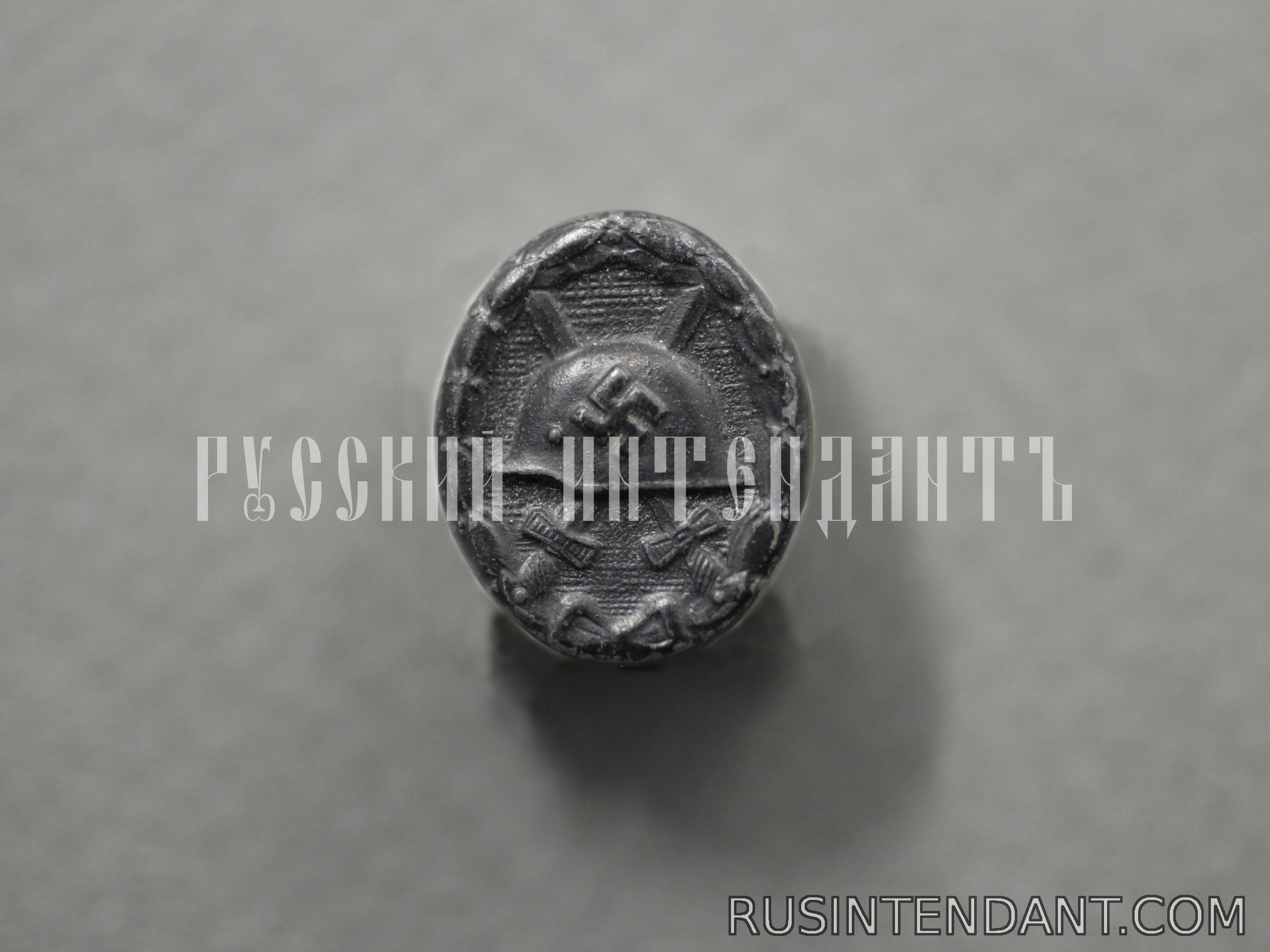 Фото 1: Миниатюрный знак «За ранение» черный 