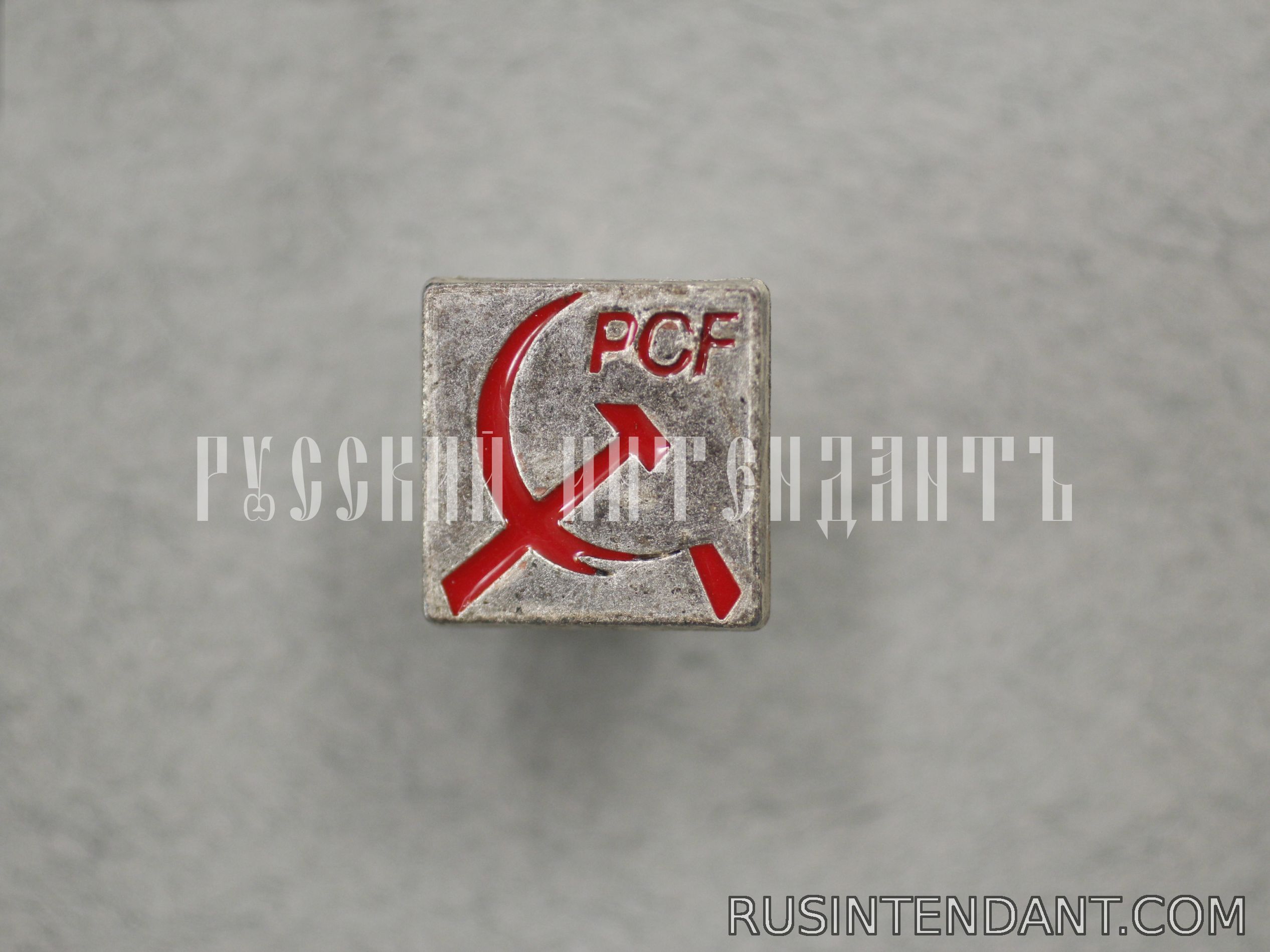 Фото 1: Знак «PCF» 