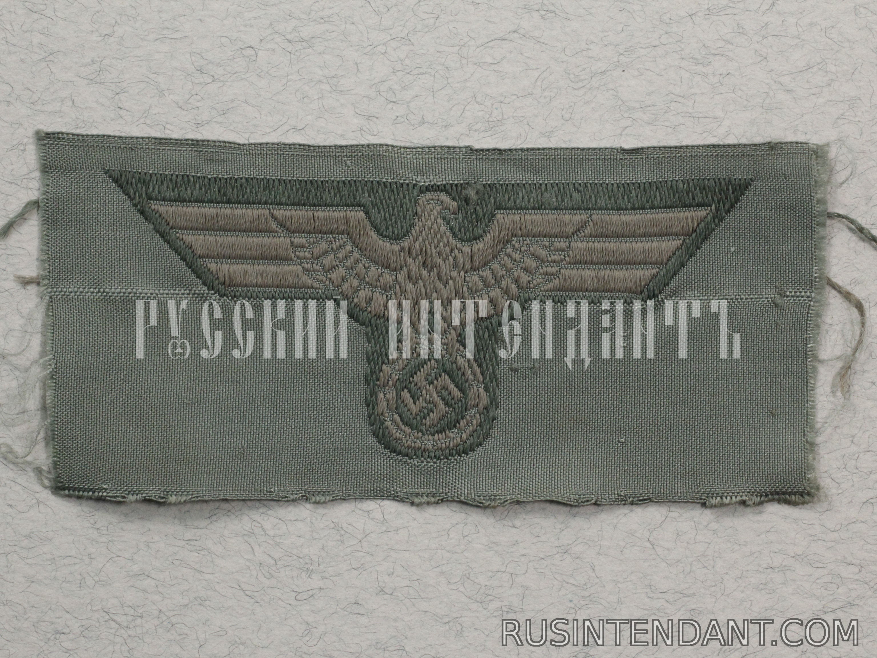 Фото 1: Эмблема на головные уборы Вермахта 