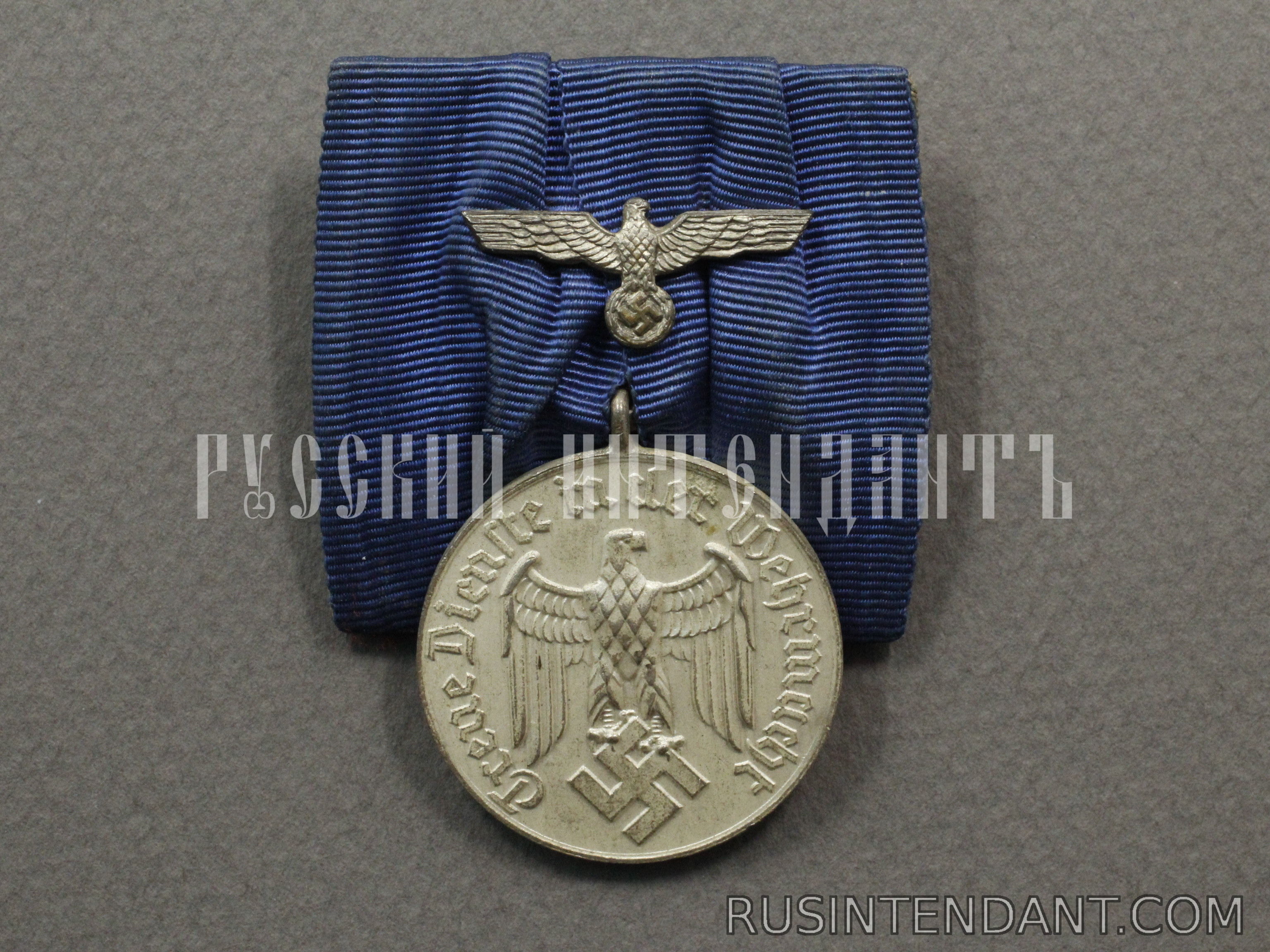 Фото 1: Медаль за 4 года выслуги на колодке 