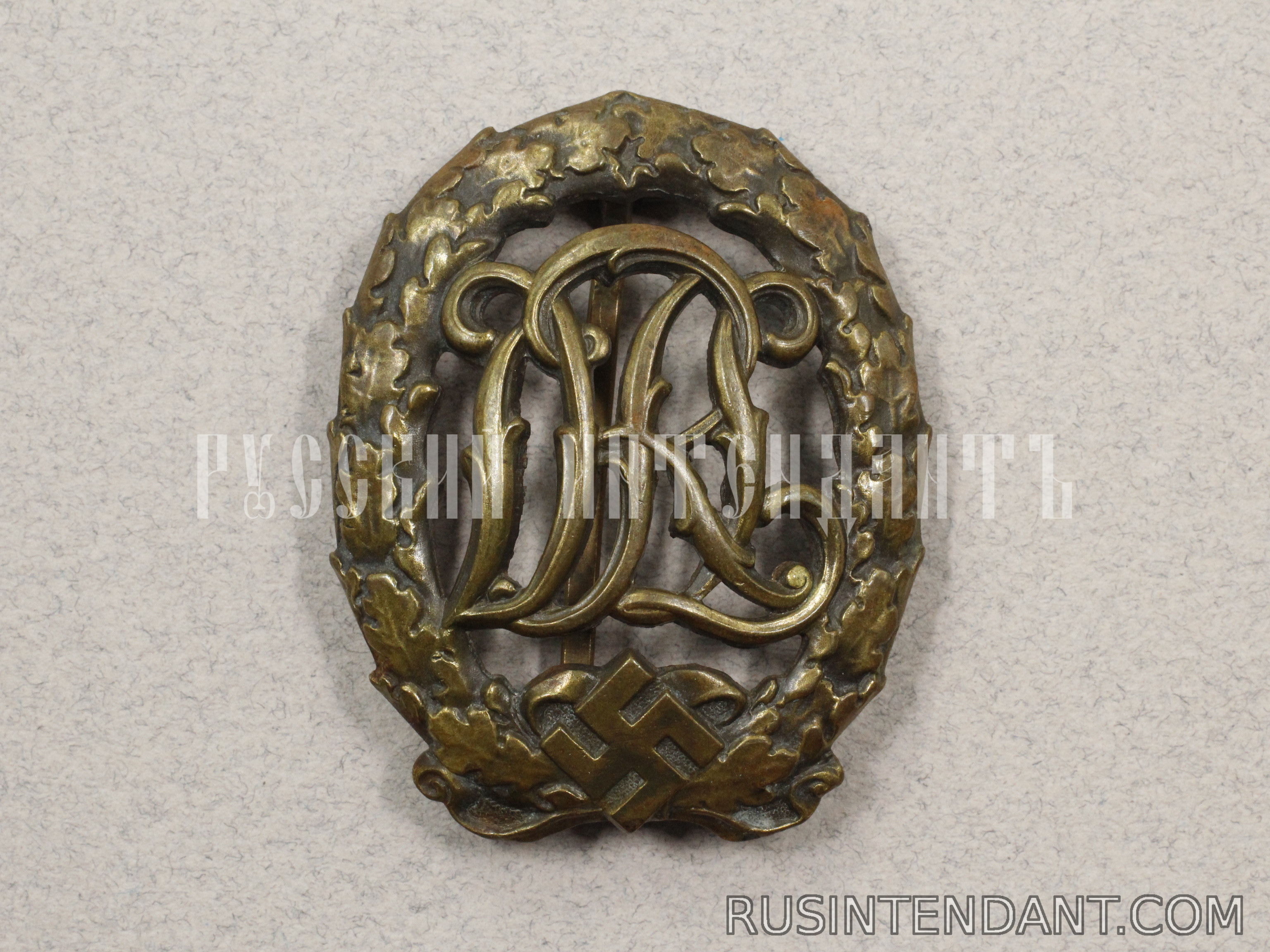 Фото 1: Спортивный знак DRL в бронзе 